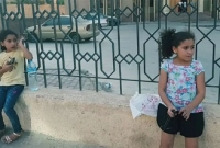 মা বন্দী : জেলগেটে দুই অবুঝ শিশুর অপেক্ষার ছবি ভাইরাল