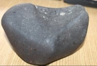 আকাশ থেকে পড়লো বিশালাকৃতির কালো পাথর, এলাকা জুড়ে আতঙ্ক