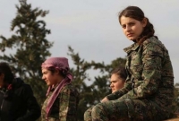 জাতিসংঘ দফতরের সামনে শরীরে আ'গু'ন দিলেন তরুণী