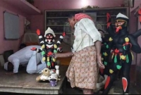 বৃষ্টি থেকে বাঁচাতে দেবী প্রতিমার আশ্রয় হলো নামাজ ঘরে