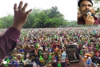 বৃষ্টি উপেক্ষা করে পানি পড়া নিতে হাজারো মানুষের ঢল