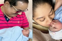 নানা হলেন ডিপজল, নানা-নাতি একে-অপরের দিকে তাকিয়ে ছবি