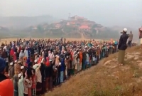 চলছে দোয়া মাহফিল, ‘গাম্বিয়া গাম্বিয়া’ স্লো'গানে মুখ'র রোহিঙ্গা শিবির