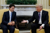 ইরানে যাত্রীবাহী বিমান বিধ্ব'স্তের দায় ডোনাল্ড ট্রাম্পের ঘাড়ে চাঁ'পালেন জাস্টিন ট্রুডো