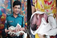 রেললাইনে জন্ম নেয়া নবজাতককে কুকুরের মুখ থেকে বাঁ'চালো পুলিশ
