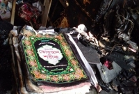 আগুনে দোকানের সব পুড়ে গেলেও অক্ষ'ত রয়েছে পবিত্র কুরআন