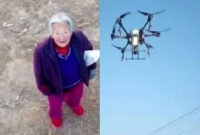  মাথার ওপর ড্রোন এসে বলল, চাচি মাস্ক ছাড়া বাইরে হাঁটা উচিত নয়!