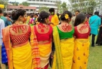 অত্যন্ত লজ্জাজনক; বসন্তোত্‍সবে তরুনীদের খোলা পিঠে লেখা অ'শ্লী'ল শব্দ!