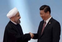 বাণিজ্য ক্ষেত্রে ডলারের লেনদেন বাদ দেয়া এবং মার্কিন নিষে'ধাজ্ঞা এড়ানোর লক্ষ্যে চীন-ইরান চুক্তি