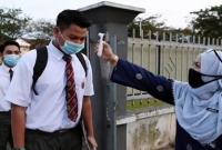 করোনা প্র'কোপ কমতে থাকায় ৪ মাস পর স্কুলে ফিরেছে মালয়েশিয়ার শিশুরা