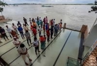 পদ্মার ভাঙ্গনে বিলীন মসজিদের একাংশ, তবুও নামাজ আদায়