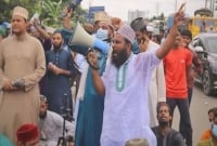 আহমদ শফীকে নিয়ে ক'টূক্তির অভি'যোগে গ্রে'ফতার আলাউদ্দিন জিহাদীর মু'ক্তির দা'বিতে বি'ক্ষোভ   