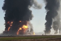 জ্বালানিবাহী শত শত গাড়ি বিস্ফোরিত হয়ে ভয়াবহ অগ্নিকাণ্ড