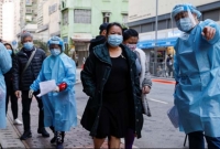 বিদেশিদের পায়ুপথে করোনা পরীক্ষা, চীনকে থামাতে বললো জাপান