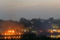 শ্মশান ঘাটে লাশের সারি ভারতে, সেই চিতার ধোঁয়া ঘন হয়ে কুণ্ডলী পাকাচ্ছে আকাশে