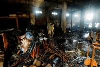 অগ্নিদগ্ধ ভবন থেকে ১৬ লাশ উদ্ধার