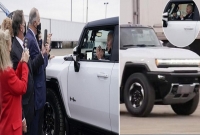 যে উদ্দেশ্যে Electric hammer গাড়ি-তে করে কারখানায় বাইডেন