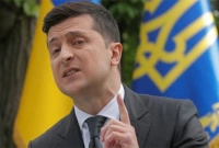 রুশ সৈন্যদের বিরুদ্ধে লড়াইয়ে দেশের জনগণকে অ'স্ত্র হাতে তুলে নেওয়ার আহ্বান ইউক্রেনের প্রেসিডেন্টের