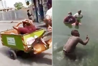 লঙ্কান বিক্ষোভকারীরা সরকার সমর্থককে ধরে ময়লার গাড়িতে ফেললো!