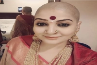 স্বামীর জন্য কেন ন্যাড়া হলেন স্ত্রী? কারণ শুনলে চমকে যাবেন!