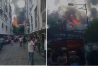 আকাশ ঢেকে যায় কালো ধোঁয়ায়