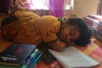 খাতার ওপর উপুড় হয়ে শুয়ে লিখে পেলেন ৯৯.৩১ শতাংশ নম্বর!