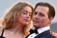 ডেপের উল্টো চাপে সুর নরম করে সমঝোতা করলেন অ্যাম্বার