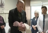 নবজাতক শিশুর কানে আজান দিয়ে নাম রাখলেন এরদোয়ান!