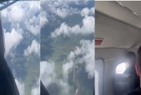 হঠাৎ মাঝ আকাশে খুলে গেল বিমানের দরজা! এ ঘটনার ভিডিও ভাইরাল