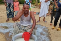 এনজিওর ঋণ থেকে মুক্ত হয়ে এক মণ দুধ দিয়ে গোসল!