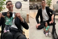 বিশ্বের সবচেয়ে লম্বা পুরুষ ও খর্বাকার নারী একফ্রেমে 