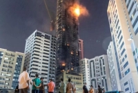 বহুতল ভবনে আগুন, লাফিয়ে পড়ে ৫ জনের মৃত্যু!