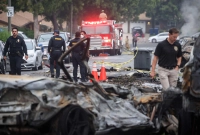 যুক্তরাষ্ট্রে মধ্যরাতে বিমান বিধ্বস্ত, বাড়ি-গাড়িতে আগুন