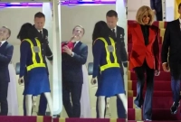 ফরাসি প্রেসিডেন্টকে প্রকাশ্যে মুখে খামচি মারেন স্ত্রী!