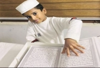 নিজ হাতে কোরআন লিখলেন ৯ বছর বয়সী শিশু