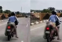 মৃত স্ত্রীকে নিয়ে বাইক চালিয়ে যাচ্ছিলেন স্বামী, পরে যা ঘটলো...