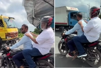 যানজটে-আটকা-পড়ে-শেষ-পর্যন্ত-বাধ্য-হয়ে-মোটরসাইকেলে-সড়ক-উপদেষ্টা