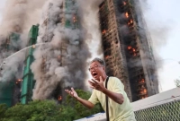 হংকংয়ে-বহুতল-আবাসিক-ভবনে-ভয়াবহ-আগুন-নিহত-৪