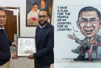 তারেক-রহমানকে-‘আই-হ্যাভ-অ্যা-প্ল্যান’-শীর্ষক-কার্টুন-হস্তান্তর